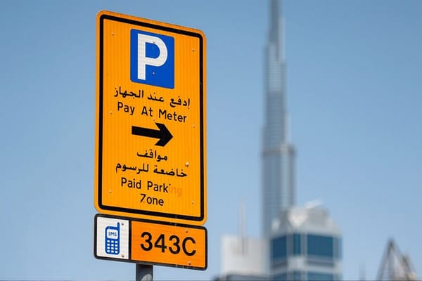 Dubai parking sign near Burj Khalifa indicating paid parking zone